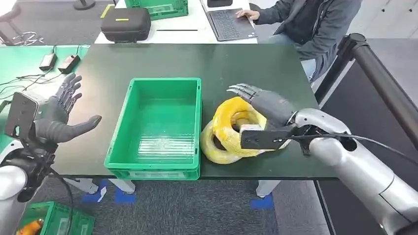 Robot arm and dexterous hand teleoperated with a glove and VR headset