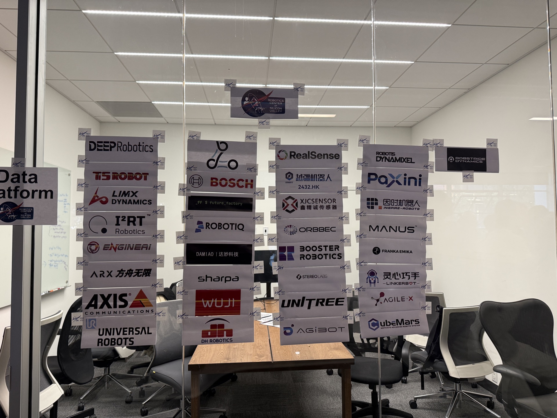 Founders and builders networking at the Robotics Center lab